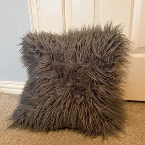 Grey fluffy pillow